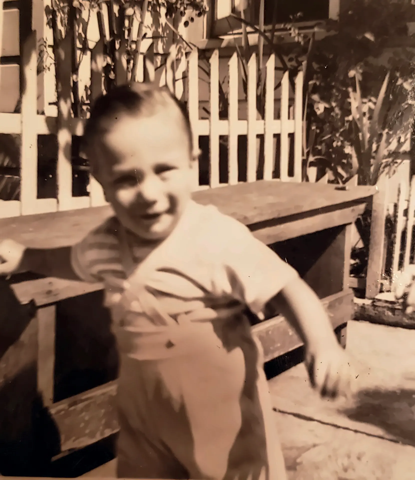 Andre as a toddler in the family garden