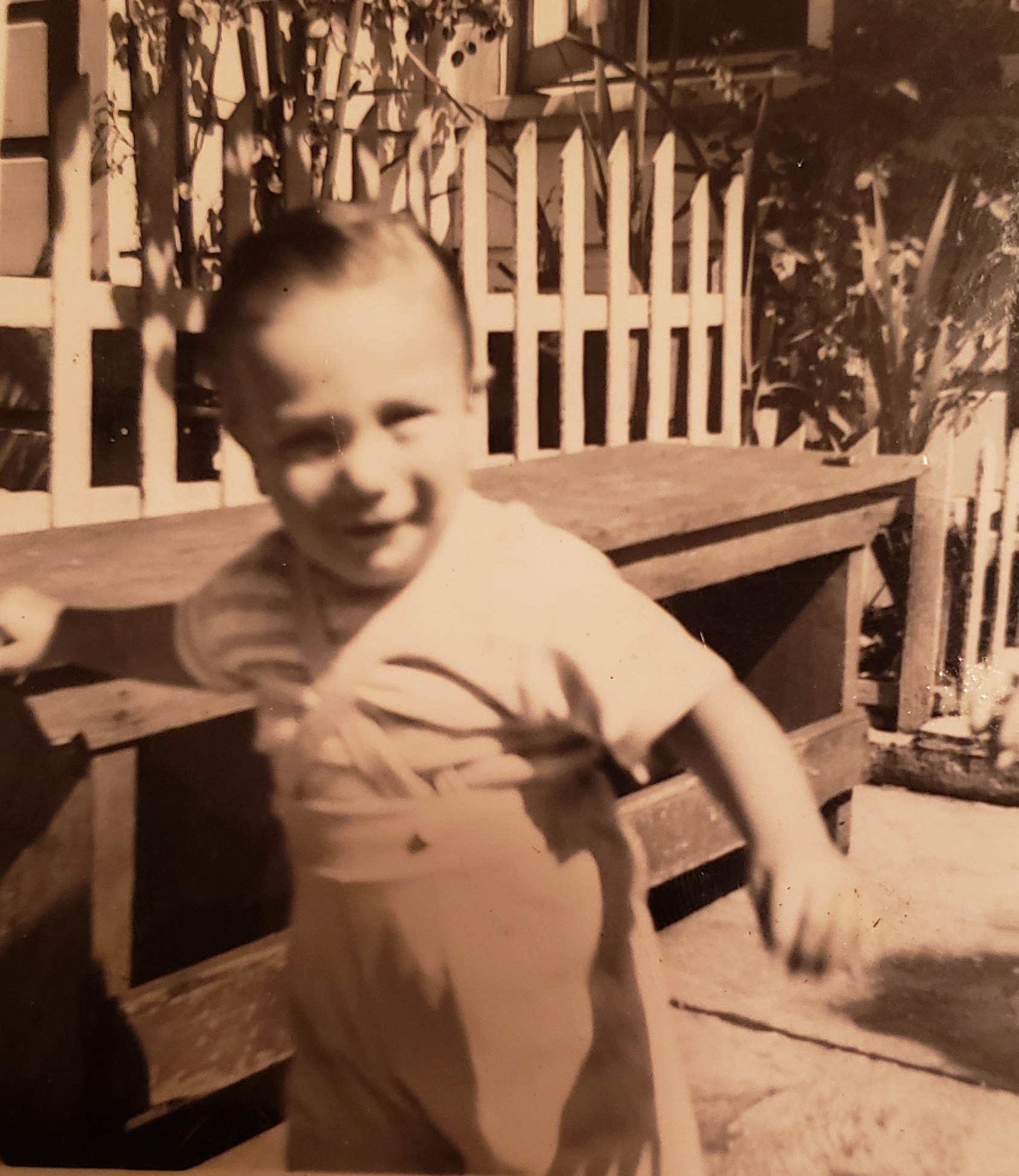 Andre as a toddler in the family garden